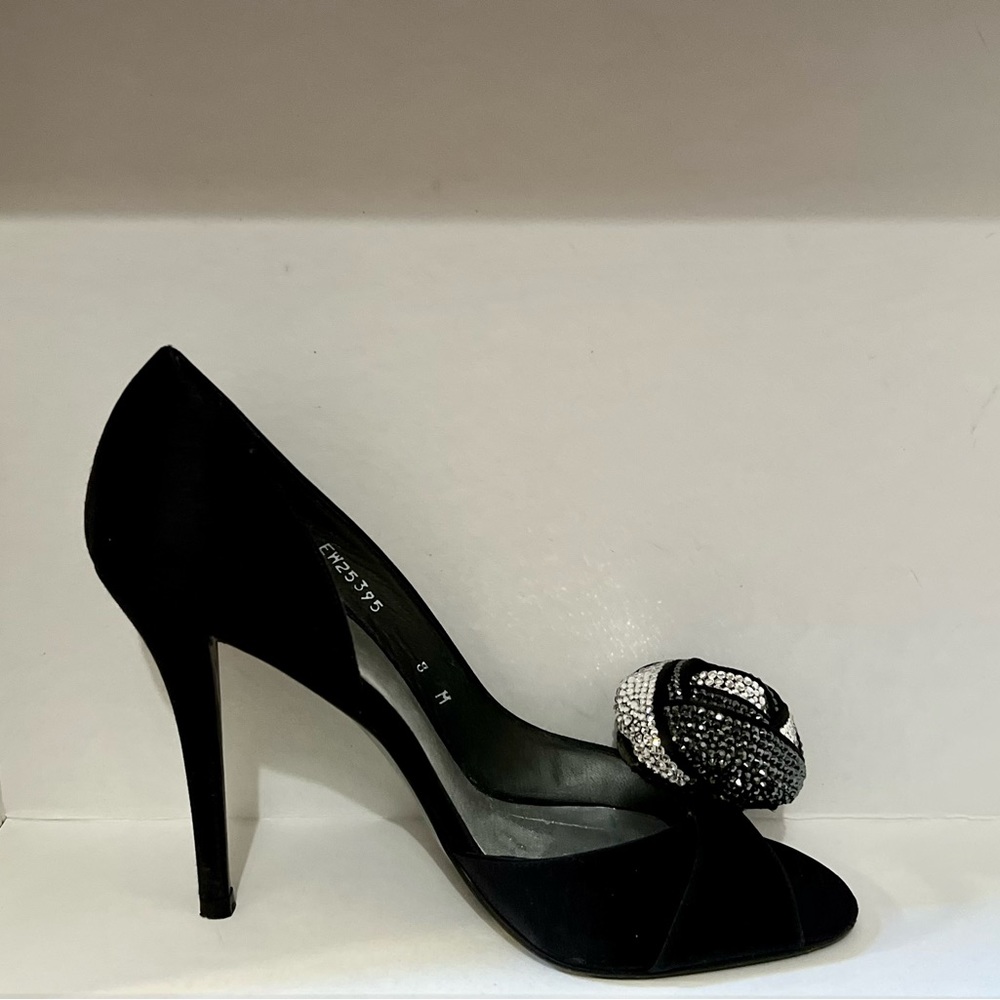 Stuart Weitzman size 8. Black satin heel with crystal flower